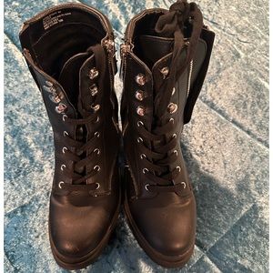 Woman’s Moro combat boots with studs.  Worn a handful of time.  Black leather
